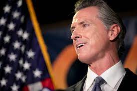 California governor, Gavin Newsom giving a speech.