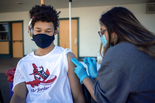 Student getting vaccinated. 