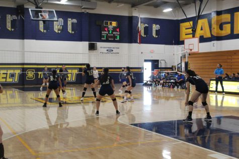 Lady Eagles Volleyball remain focused during the game. 