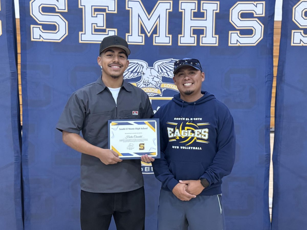 Health/PE student of the month Hector Cimental with Mr. Rodriguez 